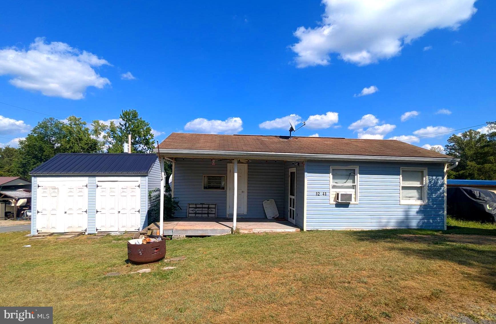 Check out this corner lot. Covered front porch. Nice large shed to store all your belongings. Lot can convey with a 2023 Kawaski side by side for an extra $10,000.00 if one is interested. Quaint kitchen, living room. Lot is close to amenities such as the pool, playground, camp store, bar restaurant, volley ball, church. Come check this lot to call your own.
** WELCOME TO RIVER BEND/SEASONAL LOT AVAILABLE TURN KEY** River Bend is a privately owned 400 acres recreational- vehicle camp resort with seasonal activities for members, families and guests. This great RV park is tucked away on the Upper Potomac River of West Virginia, River Bend is one of West Virginia's most popular family seasonal destinations. . Just a short drive from the Washington and Baltimore metro area. Open with utilities from April 1 to November 1. Lot owners have access to their property the entire year. *** Members Enjoy *** * Amazing views and wildlife, Potomac River access, Trails, Swimming pools, Mini-Golf, Youth center, Tennis and basketball courts, laundry facilities, convenience store, deli and lounge. *Bath houses through out the park, boat ramp, bar and grill and even a church located on the grounds. River Bend also hosts numerous activities such as 4th of July fireworks, small carnival, bonfires, poker runs, horseshoe tournaments, car show, Halloween Trick or Treat and so much more.