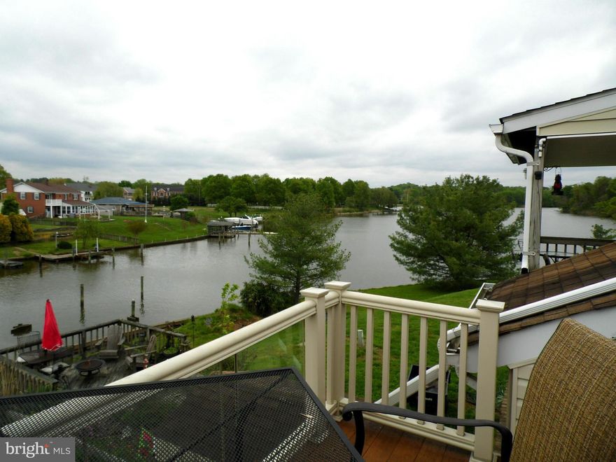 Tie up to your private dock in "Ft Lauderdale North".  Toast the sunset on the TREX deck overlooking your dock or off your 2nd story balcony.  Cook the fish you just caught in the Bay or off the pier in your renovated kitchen with quartz counters and new flat top range.  New paint, new carpet - clean, bright,and ready to go!  What are you waiting for?  Live like you're already on vacation.