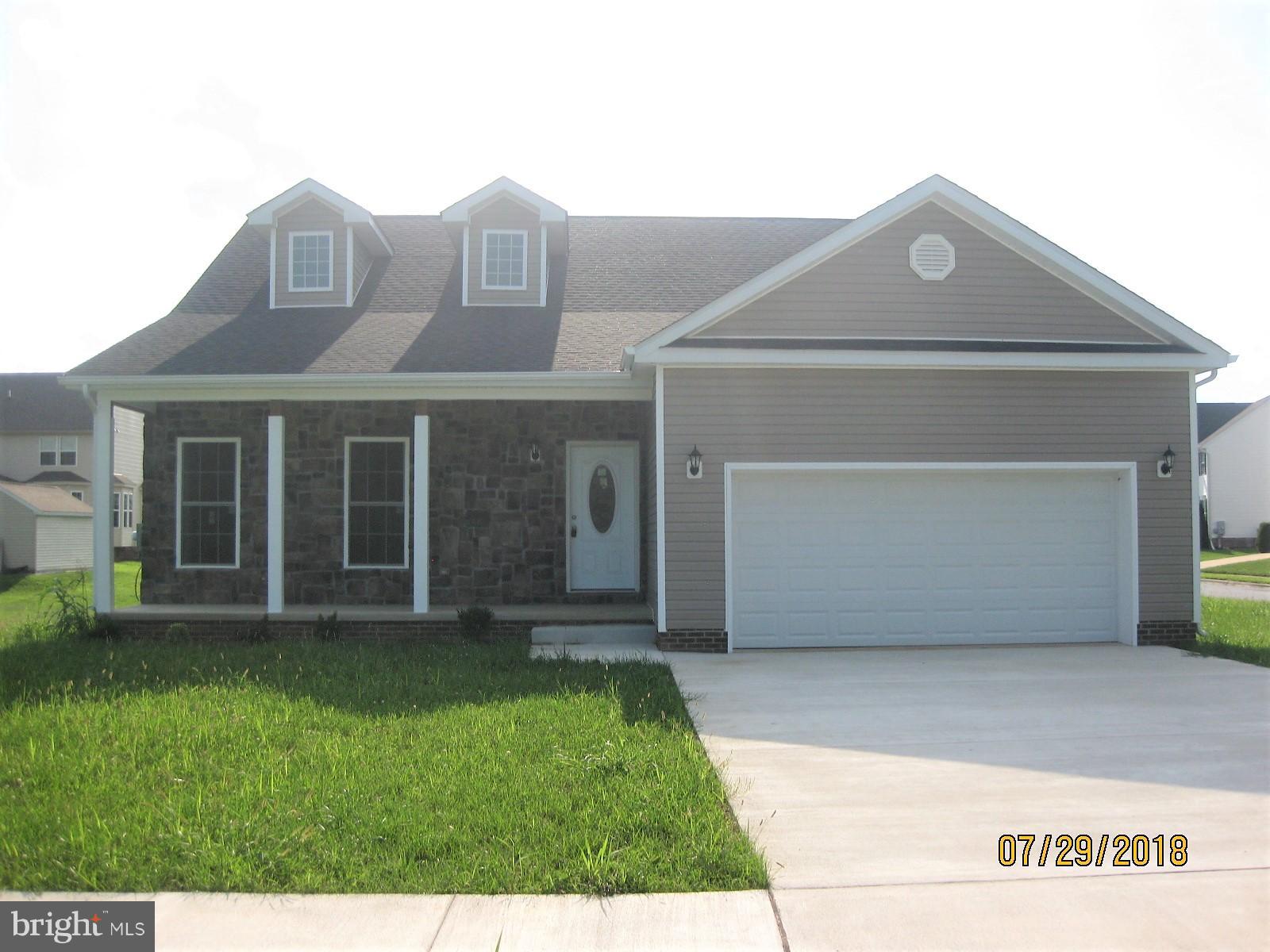 Builder has completed this home and has reduced the price to Sell! Corner Lot with many upgrades and great neighborhood. This spacious Rancher has an open floor plan. Vaulted ceiling in Family Room, Dining Room, Kitchen, and Foyer with hardwood floors. Kitchen has 42' Cabinets, & SS Appliances, & Large Pantry, Large Master Bedroom with walk-in closet, Laundry Room with custom ceramic tile, Baths with custom ceramic tile floors and custom tile in shower/tub area. Trex Deck for great entertaining. 2 Car garage with garage door opener! This home is ready for you to move into right now.