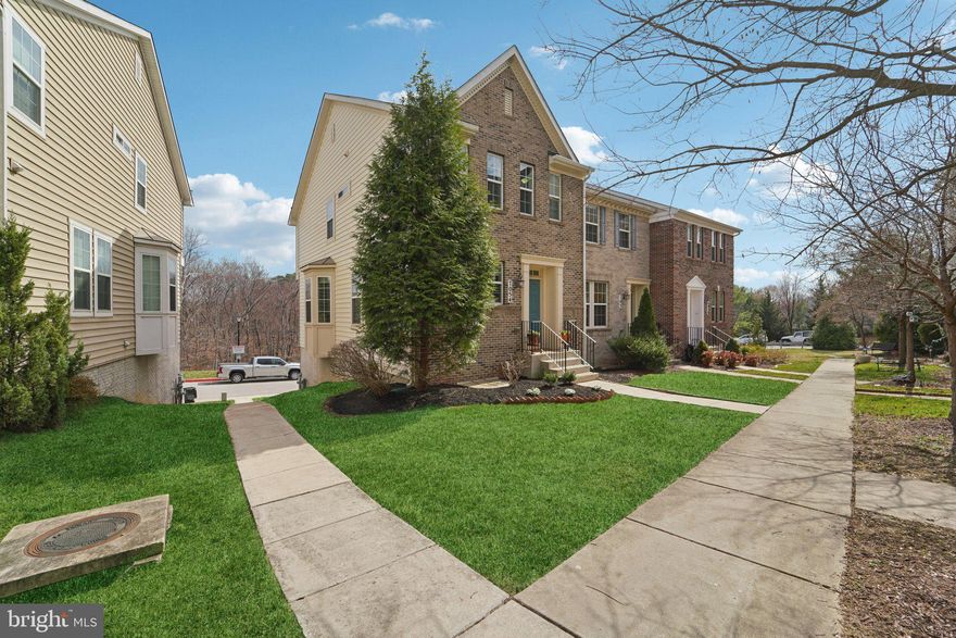 Welcome to Fox Hunt Estates. This end unit brick front townhome offers a premium setting, thoughtful upgrades, and a functional three level layout.

Upon entry, you are welcomed by a light filled open concept main level with hardwood flooring throughout. The spacious living room flows seamlessly into the dining area, creating an ideal layout for both everyday living and entertaining. The gourmet kitchen is positioned just beyond, featuring an oversized island, granite countertops, gas cooktop, and double wall ovens. A rear deck extends the living space and provides the perfect setting for outdoor entertaining.

The upper level offers three generous bedrooms, including a spacious owner’s suite with a private en suite bath and a large walk-in closet complete with custom organizers.

The lower level adds versatility with a fourth bedroom, full bath, and additional storage space, ideal for guests, a home office, or flex living.

The rear load two car garage includes an epoxy finished floor and electric vehicle charger, along with a driveway that accommodates two additional vehicles.

Positioned on one of the best lots in the community, this home is located at the end of the street and backs to open space with a wooded view, offering both privacy and a peaceful setting.

Conveniently located approximately 7 miles from Fort Meade and 30 miles from Washington, DC, this home offers a balance of comfort, location, and accessibility.