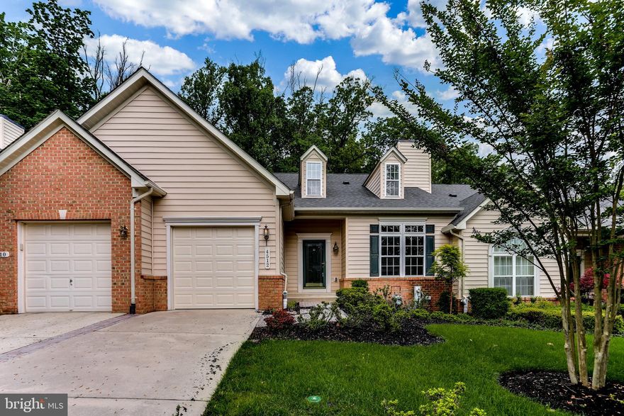 Fall in love with this luxury villa in the heart of the gated 55+ community of Villages at Woodholme! This move-in ready home is ideal for entertaining and everyday living, with a wide-open living and dining room graced with soaring ceilings, a stunning stone and marble gas fireplace, and polished hardwood floors. The gourmet kitchen is perfect for the home chef with granite counters, an island, and space for dining. Just beyond the kitchen is the bright, airy family room with access to private deck overlooking trees. The main level master suite boasts a spa-like bathroom and walk-in closet. An oversized laundry room and powder room complete this fabulous main level. Upstairs find 2 additional bedrooms, a full bath, spacious storage closet and a generous loft with custom top-lit cabinets. An outdoor pool, tennis courts and putting green are available to all residents at the large community center. Welcome to your home to the Villages at Woodholme!