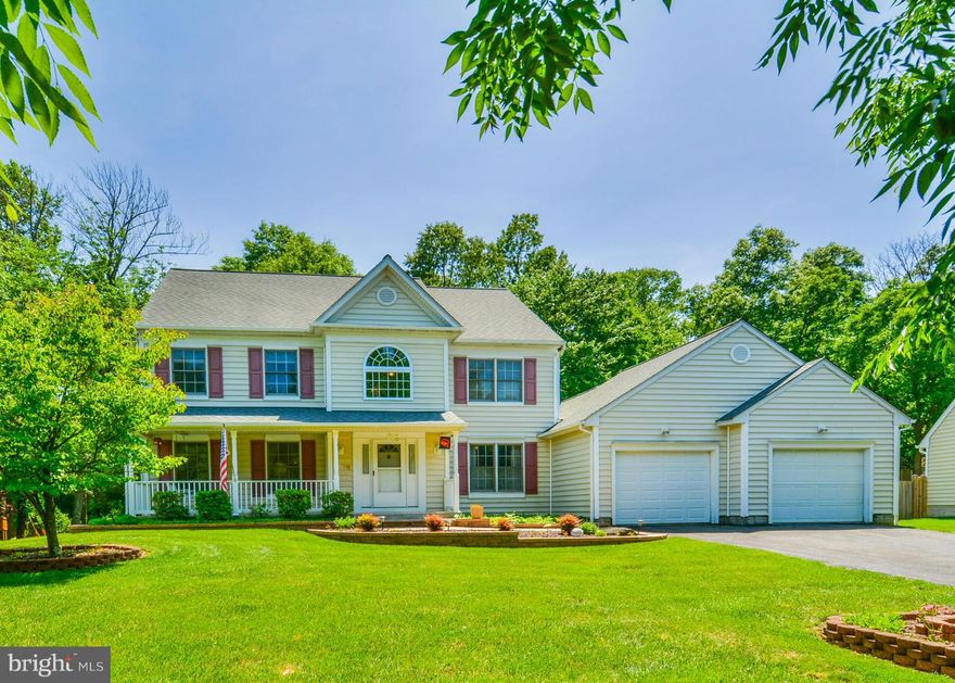 Beautiful Custom built home! 1st floor master suite,main level laundry, granite counter tops, eat in kitchen, five additional bedrooms upstairs, 2 story foyer, main lvl den with built ins, brand new wood stove in Fam Room.Big open Finished basement & workshop, tons of storage, walk up to huge flat back yard,gorgeous view, back deck & shed. Solar Panels are OWNED not leased. Cul de sac lot!