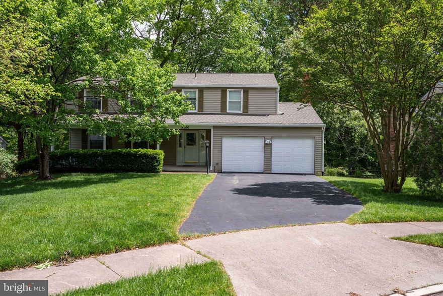 Welcome to this beautiful Colonial home located on a cul-de-sac with beautiful tall shade trees in the rear.  Greet your friends and neighbors from your full covered porch.  Enter the lovely main level with hardwood throughout with the exception of the family room which sports new carpet.  This home offers sophisticated and stylish living with hardwood flooring on the main level, a new modern white kitchen with granite counters and stainless steel appliances  which are complimented by a spacious eating area open to the family room. A cozy family room with fireplace, living room, powder room and formal dining room finish off the main level.  Move outside to the large deck, great for BBQs and entertaining.  The upper level boasts 5  bedrooms on the upper level as well as 2 full baths.  The primary bedroom with new bath and walk-in closet and four additional bedrooms all with new carpet,  as well as new bathroom is sure to please. The lower level has a great area for exercizing, family fun and entertaining as well as a powder room and  unfinished area, great for storage.  Walkout to your treed rear yard !!  This home is "like" new with new roof, gutters and downsouts, hardwood and carpet, newer HVAC, hot water heater and sump pump, kitchen and baths.   Better than new and ready to move into!  Walk to the elementary school. Newington Forest  offers a swimming pool, tennis courts, basketball courts, tot lots and community center.