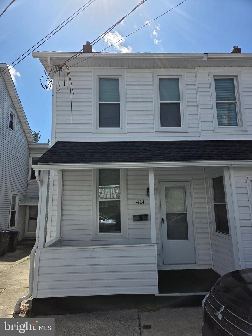 Adorable semi-detached home that has been renovated from top to bottom.  Enter into an open living -dining area for optimal entertainment. Home has been completely updated in the past 2 years and made into a cozy yet functional place to call home. Newly remodeled kitchen has optimal counter space and all new appliances including a gas range.  Enjoy summer evenings in your enclosed porch. Second floor boasts three generous sized bedrooms and full bath.  Front porch allows for relaxation. Walk out basement to a fenced yard is an extra bonus. This is a complete move in ready home. Note all the updates on the home improvement list. Close to all the amenities you could ask for. Great little starter home or downsize option.