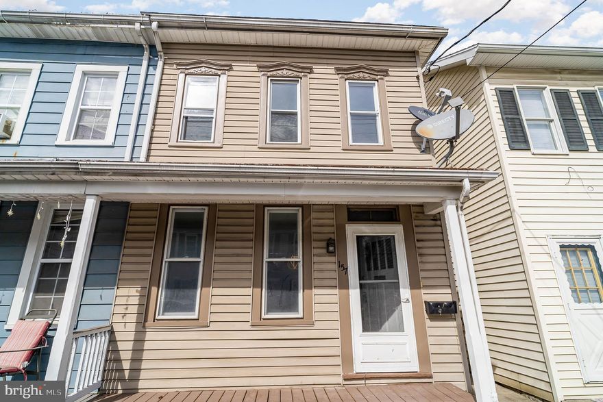 This updated property is a must see! The home has been completely renovated throughout with newly painted walls, new LVP on all the floors, new lighting, updated electric service, all new interior doors, both bathrooms are all new and the kitchen boast new cabinets and new appliances. Unique architectural accents enhance the half walls between the living room and dining room.  Even doing laundry won't seem like a chore as the laundry room is brightened with a large window!  There are 3 bedrooms and a another full bathroom on the second level.  The rear bedroom offers a small balcony to enjoy summer evenings!  Room for storage in both the attic and basement. Minimal lawn care needed on the back yard beside the cement patio which offers enough space for outdoor furniture and a grill!   Additional storage available in the outdoor shed.  Don't wait to schedule a viewing of this property.