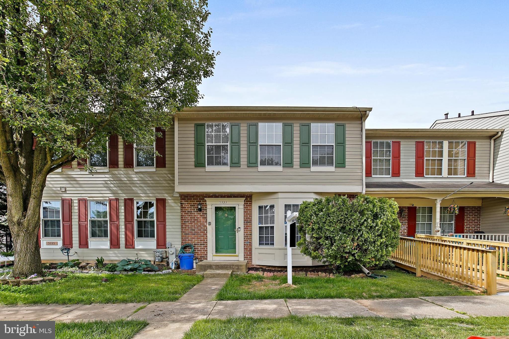 Welcome to this beautifully maintained townhome in the desirable Castle Stone at White Marsh community. This spacious 3-bedroom, 2 full and 2 half bathroom home features a bright and airy open-concept main level with hardwood floors throughout. The eat-in kitchen boasts stainless steel appliances, including a brand-new microwave, vinyl countertops, and ample cabinet space. The separate dining area flows into a sunken living room with ample space. Upstairs, you'll find three generously sized bedrooms, including a primary suite with a walk-in closet and en-suite bathroom. The fully finished walk-out basement offers additional living space, a half bath, and a laundry area. Enjoy outdoor living on the expansive deck overlooking a fenced backyard. Recent updates include a new main water line replacement, ensuring peace of mind for years to come. Conveniently located near major commuter routes, shopping, and dining. Don't miss the opportunity to make this move-in-ready home yours!