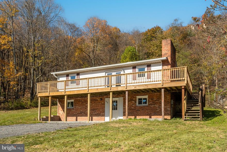 Recently remodeled home situated on a picturesque one-acre site. It feels like new from the moment you walk in – updated flooring, paint, appliances, and concrete patio. Offering four bedrooms, two baths and a great kitchen island to enjoy with family and friends.  One more great feature is both the upper and lower level offer a wood burning fireplace, which makes any chilly evening feel warm and cozy. Relax outside on the wrap around deck, or rear patio. The location is just minutes from State Parks, Deep Creek Lake, and I-68. If you are looking for a great first-time home or a long-term rental property, this is it!