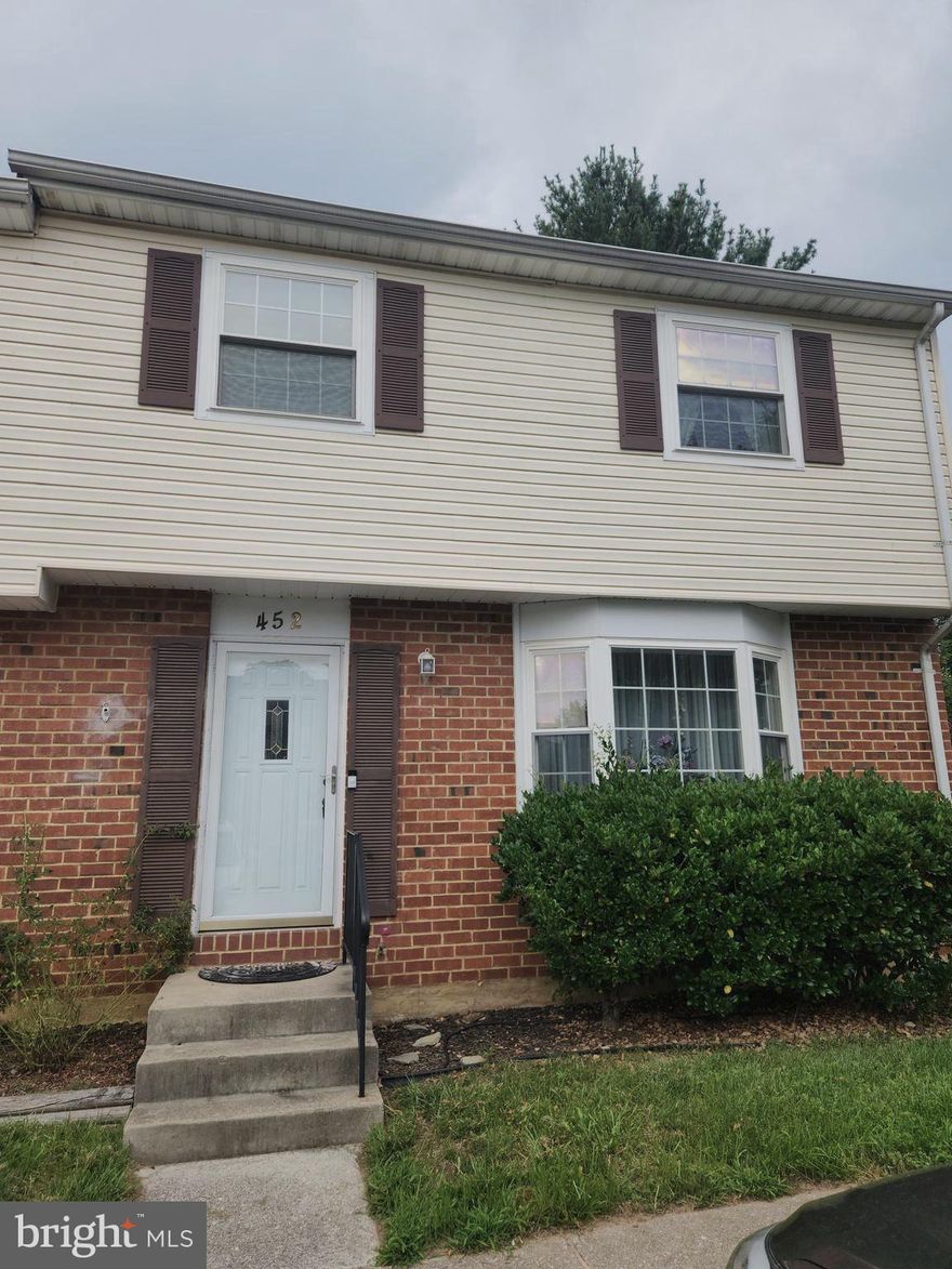 This Well Maintained End Unit Townhouse Would Be a Perfect Place to Call Home!  Located in Elvaton Towne Condominiums Community. It boasts of ample amount of space and storage, as well as 4 bedrooms, 2 1/2 bathrooms, kitchen with double oven, attic with pull down stairs as well as insulated cover, finished basement with bar, large laundry and utility room and private back deck that is fenced in. Perfect for outdoor living and grilling. Shared amenities such as a pool and basketball courts.  Conveniently located near shopping and dining. Don't miss out on this gem!! Being sold as is. Exterior(roof, siding, and lawn maintenance, parking, water, amenities) included in Condo fee.