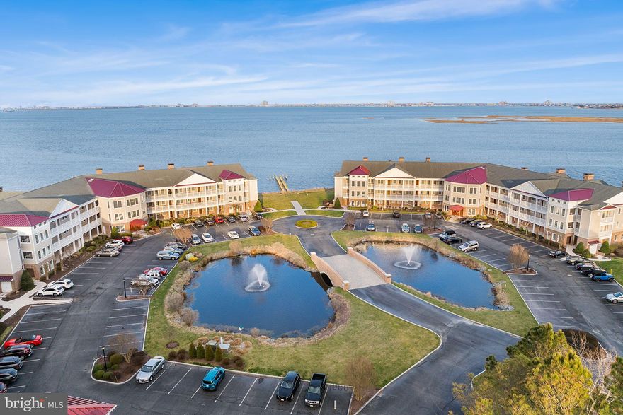 You’ve been eagerly watching The Point in Ocean Pines, waiting for the perfect top-floor condo to hit the market—and now, your patience is about to pay off! This meticulously maintained gem offers breathtaking north-facing views of the serene marsh, where you can enjoy an unobstructed panorama of majestic Eastern Shore waterfowl in their natural habitat.

Step inside to discover soaring ceilings adorned with exquisite custom trim, perfectly complemented by the warmth of natural oak floors. The ambiance is elevated further by a cozy gas fireplace, creating an inviting retreat for all seasons. But the real showstopper? A sprawling 28-foot balcony, thoughtfully designed with a partially covered section for shade and a clear, open area for sun-soaked relaxation. Imagine grilling and entertaining from spring through fall, savoring the coastal breeze with every meal.

Opportunities like this don’t come often—seize the moment and start living your waterfront dream now!
