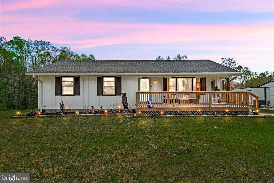 You won’t want to miss this beautifully remodeled ranch-style home situated on nearly 2 acres, complete with a detached 3-car garage and endless charm! This home has been thoughtfully renovated from the ground up, featuring a stunning new front elevation and a large covered front porch—perfect for relaxing with your morning coffee. Inside, you’ll find an inviting living space with new luxury vinyl plank flooring throughout and a fully updated kitchen designed to impress. Enjoy custom soft-close cabinetry, matching Samsung (top of the line “Bespoke Series”)  stainless steel appliances, gorgeous granite countertops, an oversized farmhouse sink, and a stylish glass subway tile backsplash. The home offers spacious bedrooms and a beautifully remodeled full bathroom featuring tile flooring and a custom tile inlay. The renovated laundry area includes pantry shelving, a utility sink, and a stackable washer and dryer for added convenience. Plus-a well-placed half bath is ideal for guests. Step outside to a large rear deck and patio area—perfect for entertaining, grilling, or simply enjoying the peaceful surroundings. The fenced backyard is ideal for pets, and three storage sheds provide ample additional space. The detached 3-car garage offers plenty of room for vehicles, hobbies, or even boat storage. Conveniently located just minutes from the town of Mineral, with easy access to grocery stores and restaurants, as well as nearby Louisa. A short drive puts you within reach of both Charlottesville and Richmond.Schedule your showing today—this one won’t last long!