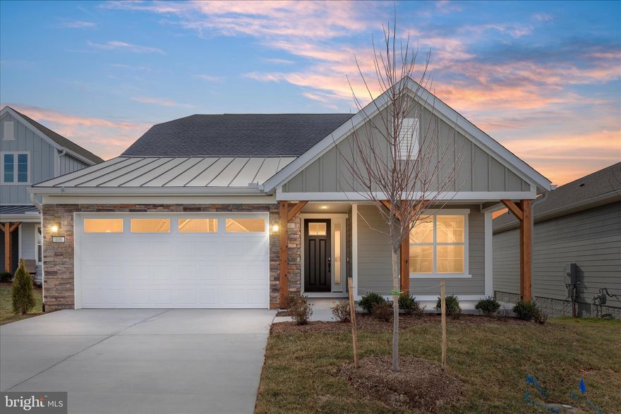 Welcome to effortless luxury living in this brand-new, never-lived-in 2025 home located in the highly sought-after 55+ Lake Frederick community. Offering 2,774 finished square feet, this home includes every upgrade you want—and nothing you don’t.

The open-concept main level is designed for both comfort and entertaining, featuring luxury vinyl plank flooring, recessed lighting, surround sound, and a spacious great room with a gas fireplace that opens directly to a covered deck—perfect for morning coffee, relaxing, or hosting guests. The Signature Kitchen Package features 36-inch upper cabinets, an island for quick lunches, quartz countertops throughout, and a layout that flows seamlessly into the living and dining areas.

The primary suite on the main level is a true retreat, offering a walk-in shower, separate vanities, and a generous walk-in closet. A split-bedroom floor plan offers privacy, with a second bedroom and full bath on the main level. A sunlit office with glass doors offers flexibility and could easily serve as an additional main-level bedroom.

The upgraded laundry room is thoughtfully designed with upper cabinets, quartz countertops, a laundry sink, and a washer and dryer included. Additional features include batt insulation, blinds throughout, and an extended garage. Outdoor living is enhanced with water irrigation in both the front and back, a covered front porch, and a covered lower-level concrete patio. 

The finished lower level features a large family room, a third full bathroom, and ample storage space, ideal for guests, hobbies, or recreation.

Lake Frederick amenities enhance the lifestyle with indoor and outdoor pools, a clubhouse, and walking and biking paths, all set within a scenic lake community. Enjoy dining at the popular Region’s 117 restaurant and the convenience of being located between Winchester and Front Royal, offering easy access to shopping, dining, and Northern Virginia.

This exceptional home is priced below the builder's $790,000 price, and the builder’s warranty provides peace of mind and transfers to the new owner. 

✨ Be sure to check out the video—this is luxury, convenience, and lifestyle all in one.