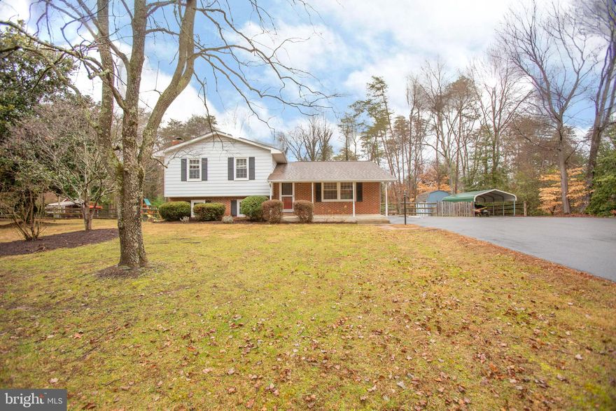 Location! Location! Location!  Just off Rte 17  & I-95.   Pride of ownership shows here in this lovely 1 acre Spacious Home,  Country living at it's best-  enjoy the quite lifestyle,  but have the convenience of only being mere minutes from Shopping, Grocery, and Interstate!  3 Bedrooms, 3 Full Baths with Basement!  Kitchen features all NEW stainless steel appliances.  Large Living Room & Separate Dining area with gleaming Hardwood flooring.  Upgraded wood flooring in hallway and Master Bedroom.   Large secondary bedrooms.  Hall bath has been recently renovated.  Additional living space and recreation in Lower Level - large recreation room with Pellet Stove and Built-in Gun Safe!     Separate laundry room with washer and dryer.    Outbuildings/sheds, chicken coop, playset & carport all convey!