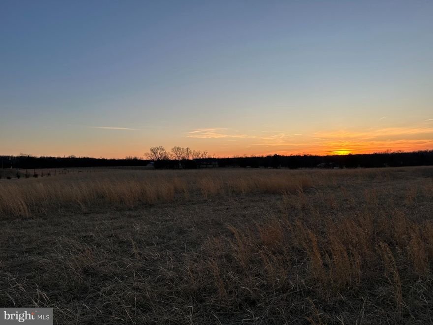 Discover this rare, UNRESTRICTED 8.5145-acre parcel. You’ll enter through a new double-gated equestrian-style entrance onto a freshly graveled driveway and find every essential piece already in place: a newly drilled 460-ft well equipped with a high-speed 20 GPM pump, plus a Health Department–approved septic permit for Class II-LPP. New perimeter fencing secures the property for livestock or crops, and it currently qualifies for Jefferson County’s ag/farm use tax exemption. Topsoil has been excavated and shale laid to create an ideal, level building site with excellent soil quality for homesteading or hobby farming. Wake each morning to breathtaking sunrises, watch abundant wildlife roam freely, and end your days with spectacular sunsets all from your very own turnkey estate, primed for immediate construction.