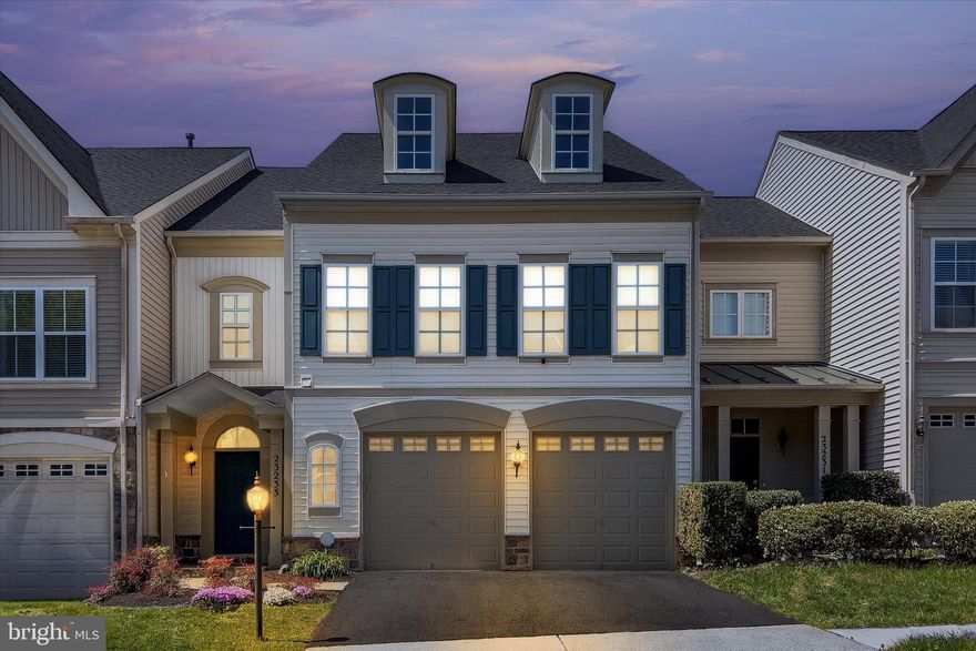 Looking for the feel of single-family living that is low maintenance like a townhome? Look no further; this gorgeous Townhome lives like a single-family home with 3000 sq. ft of living space, high
ceilings, open living areas, 2 car garage, and a spacious, private backyard. Located in a highly sought-after school triangle, Legacy Elementary, Brambleton Middle, and Independence High School. Ready to move right
in and enjoy? This marvelous townhome, constructed by Miller & Smith, offers a blend of luxury and functionality, with four bedrooms, an office, and two-and-a-half bathrooms. The residence includes a two-car garage, providing ample space and convenience.

This home has fresh paint throughout, a NEW Roof (2025), NEW Carpet (2025), an easily accessible EV Charger in the Garage, an Upgraded Kitchen with Granite Countertops, custom built closets, and much more. Come see for yourself; the built-in bookshelves, private office, crown molding, gas fireplace, and upgraded hardwood floors give the feel of class and style. The majestic main bedroom boasts high ceilings with crown molding, an upgraded ceiling fan, and an oversized walk-in closet. The en-suite bathroom is ready for unwinding and relaxing in the soaking tub, It also has a separate shower, double sinks, and a private closet. The upper level has a room for everyone, including a full laundry room and a big open loft area perfect for study stations, a home office, and/or a play area. The open floor plan includes a formal dining room and a main library/office. The family room, adjacent to the kitchen, features custom-built cabinetry and a gas fireplace. The gourmet kitchen is equipped with new quartz countertops, a large center island, a breakfast bar, and stainless-steel appliances, including a refrigerator and cooktop. 

The property also includes a landscaped, fenced-in backyard with a custom-designed stone patio. Residents can take advantage of Brambleton's amenities, such as pools, a clubhouse, tennis courts, playgrounds, and walking/jogging trails. The townhome's location offers convenient access to the Silver Line Metro and Brambleton Town Center.