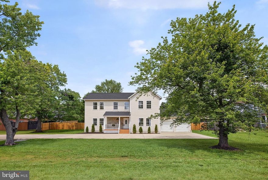 Situated on a half-acre lot find this beautifully updated two-story home offering approximately 2,858 square feet of comfortable, modern living, thoughtfully remodeled in 2005. The main level features a spacious living room, formal dining room, inviting family room, and a versatile den or office. The kitchen is appointed with elegant granite countertops and offers direct access to a rear deck.

The upper level offers four generously sized bedrooms and two full bathrooms. The primary suite includes a large walk-in closet and a luxurious en-suite bath with a jacuzzi tub and separate shower. Convenient upstairs laundry adds to the home's functionality.

This stunning residence boasts an open, flowing floor plan, high ceilings in the entryway, fresh paint, carpeting, and gleaming hardwood floors throughout. The property includes an ample driveway with a two-car garage, a charming front porch sitting area providing both comfort and curb appeal.

Ideally located within close proximity to shopping centers, dining, public transportation, and major local roads and highways, this home provides excellent convenience for everyday living and commuting.
