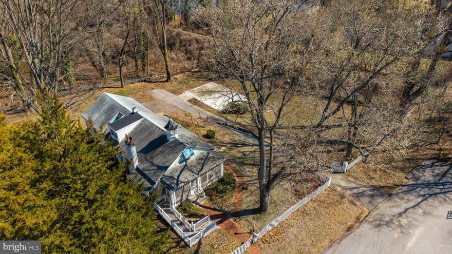 An exceptional opportunity awaits in coveted West Annapolis—a rare 0.61-acre offering with endless potential. Whether you envision a thoughtful renovation or a custom new build, this expansive lot provides the perfect canvas to create your dream residence in one of the area’s most sought-after neighborhoods. Approved civil engineering plans by Drum, Loyka & Associates, LLC and architectural designs by Custom Designs Unlimited convey with the property (city approvals secured; permits not yet pulled), offering a valuable head start toward bringing your vision to life.

The generously sized lot and current AS-IS cottage provides an abundance of outdoor space, inviting a plethora of outdoor gatherings, summer barbecues, and relaxed evenings enjoying the vibrant West Annapolis lifestyle. Just beyond your doorstep, stroll to acclaimed restaurants, local pubs, charming boutiques, and convenient street-end water access. Ideally situated near Downtown Annapolis, Navy Stadium events, and the Naval Academy, the location also provides effortless commuter access to Route 50 and the Bay Bridge for Eastern Shore escapes or travel to Washington, D.C.

A truly special setting offered AS-IS, ready for its next chapter. Welcome Home!