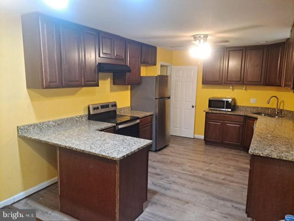 Photo of 8306 Oglethorpe St, NEW CARROLLTON, MD 20784 (MLS # MDPG2167790)