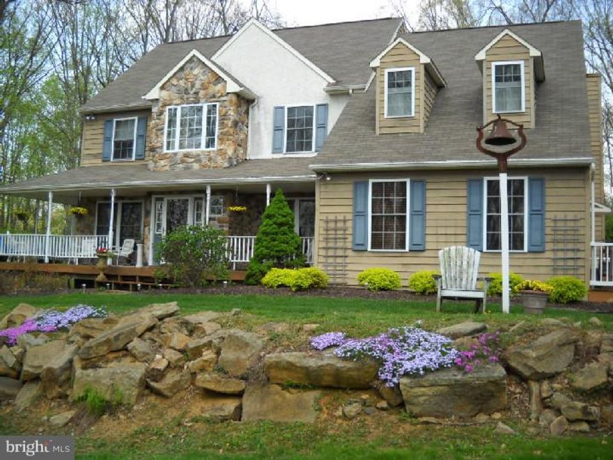 HOME WARRANTY INCLUDED! A MUST SEE AT THIS PRICE. This home has been rated Very Good to Excellent by a Certified Appraiser.  Welcome to Rocky Hill House, a Chester County Farmhouse style home, located just a few minutes from Downingtown or Morgantown turnpike exits. This 4-5 bedroom custom built home has been lovingly and meticulously cared for by it's original owners and sits secluded from the road and surrounded by the protected grounds of the Nature Conservancy offering wonderful views of nature and wildlife. Upon entering the home you will immediately notice the craftsmanship incorporated into this one of a kind home. The kitchen is well appointed with updated stainless steel appliances (including Bosch gas oven/range), exposed stone and bead board walls. With hardwood floors, upgraded/ new flooring & carpeting (including English Wool), each room, individually adorned in detail, from an English style Pub (Dining Room) to private Parlor/ Music Room (Den), Large Family Room, Large Living Room with floor to ceiling stone fireplace and hidden second staircase. The upstairs offers 4 additional bedrooms, one that has a loft, a Princess bedroom complete with Plantation Shutters, 2 dormers and bead board & chair rail, a full bath with dual vanity, along with the Master Suite. The Master offers great views, a nice walk-in closet with built in California Closet construction, a large master bath with vaulted ceilings, sky light, oversized double his/her shower, dual vanity and private commode. No need to travel for a vacation when you can escape to your own award winning paradise. Three terraced levels of patios surrounded by Oriental Koi ponds, waterfalls and exotic plantings, a massive 2 sided stone fireplace, outdoor stereo & cable TV. The 3rd terrace offers a huge (newer) 10 person Hot Tub (w/ stereo & waterfalls), outdoor shower and a stone/cedar "Hut" complete with mini fridge. Great property for pets. Rocky Hill House offers an alarm system, pet containment fencing, driveway Car-Tel system, Gutter Guards, small 2 story barn & a second oversized shed for additional storage, wrap around front porch and so much more!