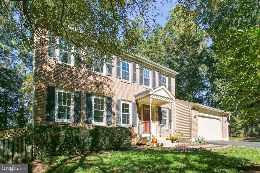 HUGE PRICE REDUCTION!!!  SELLERS ARE MOTIVATED .  HAVE PURCHASED NEW HOME.  BRING OFFERS,
This beautiful four bedroom, three and half bath colonial style home creates the impression of living in a park.  The home is located in one of the most desirable neighborhoods in Vienna, The Bluffs of Wolf Trap.  The house is within walking distance of the Spring Hill Metro station and just a few blocks to Silver Line rush hour connector bus 432!  It is a quick drive to restaurants, stores, and gas stations.  There are two large malls, the Galleria and Tyson's Corner Center a few minutes drive.  Less than a mile away is Wolf Trap National Park for Performing Arts.  For those who commute, it is minutes to major roadways.  What a location!  This home has been continually updated throughout the years including new roof, siding, gutters, skylights, HVAC, deck, remodeled kitchen and bathrooms, and more!  Please take a look at the interactive floor plan and tour.  There is a copy of the brochure with improvements list under documents.