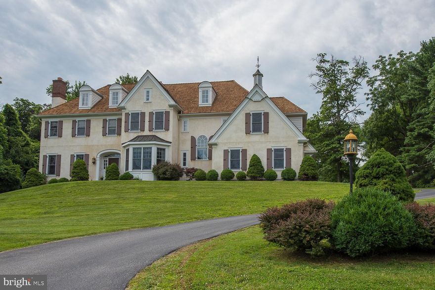 Custom Built by Pholig Builders! This 13-year old Colonial Estate Home sits on a lovely cul-de-sac in Villanova. Features include curved walls & archways, raised paneled wainscoting, custom cabinetry & hardwood flooring which are in line with the ever tasteful architectural heritage of the Main Line, while updated materials, an open floor plan & luxurious amenities create a sense of calm and serenity. Grand scaled living & entertaining spaces include Living & Dining Rooms & Family Room with coffered ceiling. Gourmet Kitchen has Wood Mode cabinetry & the adjacent Breakfast Room opens to a flagstone Terrace. A handsome Library is enhanced with custom cabinetry. 2nd floor is highlighted by a Master Suite with trey ceiling & luxurious Bath plus 4 additional Bedrooms. Lower Level features a large Rec. Room with built-in entertainment cabinetry and billiard area; complete wet-bar & wine cellar, Bonus Room, Bedroom & Bathroom. Breathtaking 1.58 acres with beautifully landscaped grounds. Additionally, the home was designed by Michael Visich. New buyer can apply for lower taxes by end of August, 2019