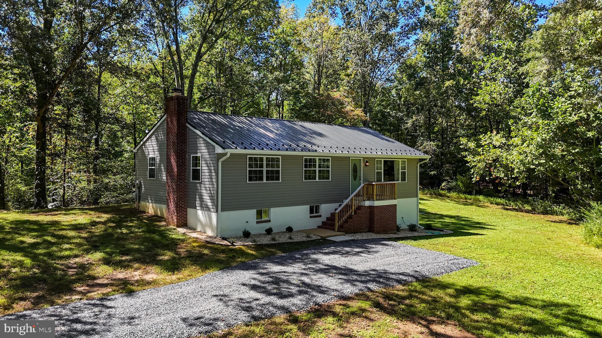 *Offer Deadline for Friday, September 12th, no later than 6PM.* Privacy, peace and pristine are all words that describe 23745 Bayside Road. This three bedroom, two bath rambler has been fully updated with today's modern finishes and custom features like wood pantry shelving & other great features, giving you style in every room. Nestled on one acre of extremely private land with a long winding driveway, this home welcomes you with an abundance of natural light, brand new LVP flooring throughout the main level and so much more. The kitchen shines as the centerpiece, complete with white cabinetry, stainless steel appliances, and granite countertops overlooking your large living room. Both bathrooms have been beautifully renovated with today’s trends in mind and the newer HVAC system ensures year-round comfort. A spacious unfinished basement with painted floors, and one-car garage provides plenty of storage and potential for customization. Fresh landscaping and professional power washing add to the properties excellent curb appeal. With no HOA you’ll have the freedom to enjoy YOUR property YOUR way. Located just minutes from Leonardtown shops, dining and waterfront experiences. This home offers privacy without sacrificing inconvenience. Don’t miss the opportunity to make this your next home, schedule a private tour today!