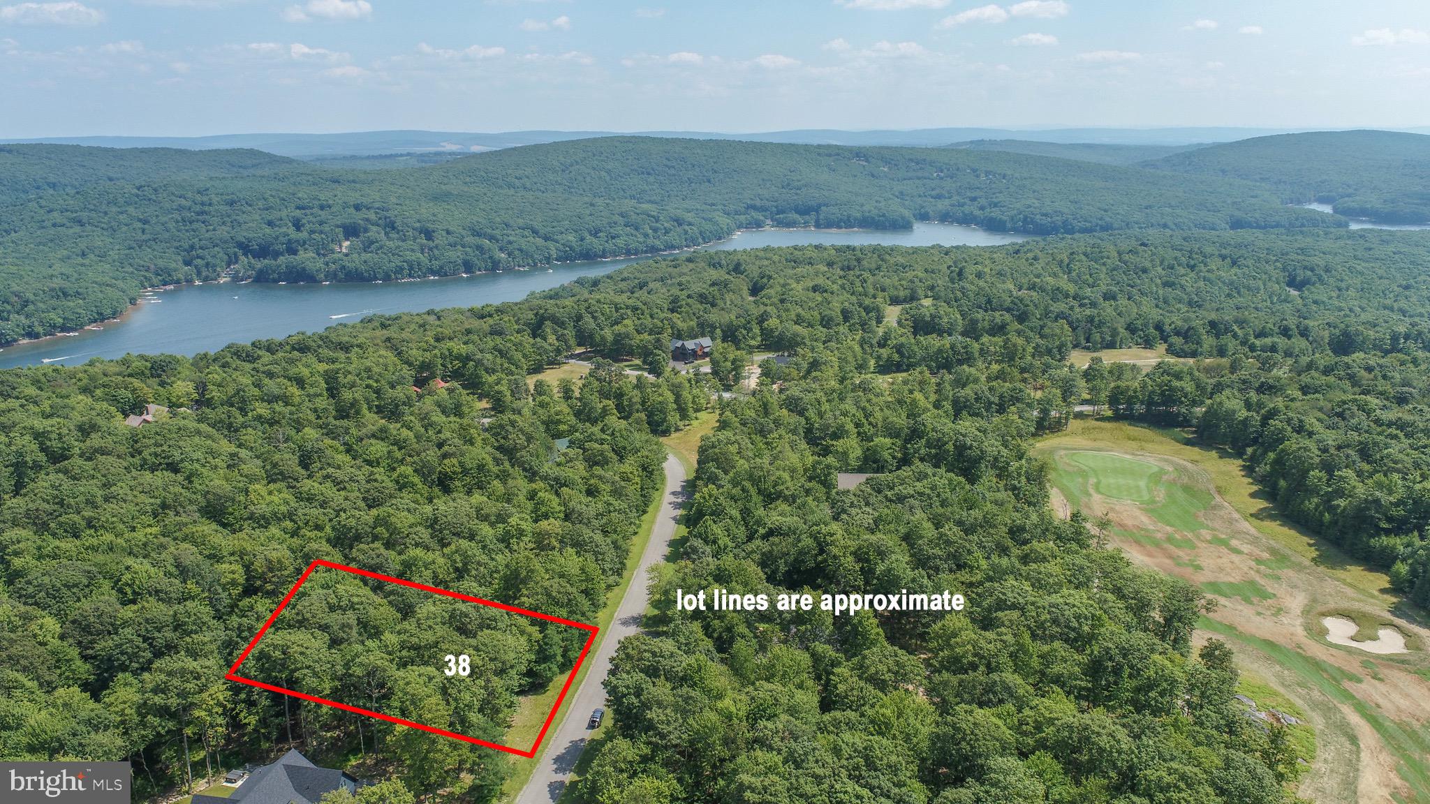 Experience mountaintop living at its finest! Lot 38 Fern Loop Drive offers .61 acres of land in the Lago Vista community, one of Deep Creek Lake's premium mountaintop communities. Public water and sewer are available. Electric is at site. Minutes to Wisp, ASCI and all of Deep Creek Lake's attractions!