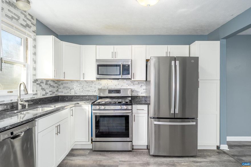 New buyer has the opportunity to assume the existing owner's loan with an interest rate of 2.75%, pending lender discretion and approval.   Welcome home to this beautifully renovated 3-bedroom residence offering comfort, convenience, and modern updates throughout. With over 1,000 square feet of thoughtfully designed living space, this home features a bright and functional layout ideal for everyday living or entertaining. Recent renovations enhance the home?s appeal while maintaining a warm, inviting feel.  The property includes a full bathroom, off-street parking, and an outdoor building that conveys with the sale?perfect for storage, a workshop, or hobby space. Located just 1.5 miles from West Main Street, you?ll enjoy easy access to dining, shopping, and local amenities while still benefiting from a quiet residential setting.  A move-in-ready opportunity in a convenient location?don?t miss it.