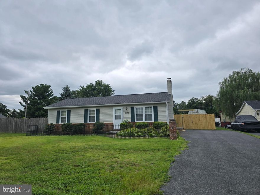 Great 3 bedroom home just moments outside of town. Large one acre lot that is fenced in the back.