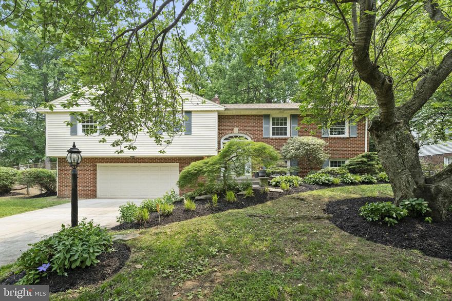 Welcome to 12202 Blaketon Street in the charming Watkins by the Park neighborhood of Upper Marlboro! Situated on a sprawling lot and nestled on a peaceful cul-de-sac, this exquisite 4 bedroom, 2.5 bathroom home harmoniously combines comfort, style, and convenience.

As you step inside, a grand foyer warmly greets you, setting the tone for all this home has to offer. The expansive living room offers a versatile space that can graciously accommodate lively gatherings or serve as a tranquil sanctuary, allowing you to unwind from the outside world. Perfect for intimate dinner parties, the spacious dining room exudes a cozy ambiance. Prepare to be delighted by the updated kitchen, adorned with sleek stainless-steel appliances, chic wood cabinets, and luxurious granite countertops. Accessed from the dining room, a charming patio invites you to enjoy alfresco dining and relaxation.

Venture down the hallway to discover four generously sized bedrooms, each providing ample space for restful nights and personal retreats. The primary bedroom is a haven of serenity, featuring two closets and an ensuite bathroom. Three additional bedrooms offer versatility and comfort, accompanied by an updated ceramic tile hall bathroom.

Descend to the lower level, where a recreation room awaits, complete with a fireplace that sets the stage for cozy evenings and entertaining guests. The lower level also houses a convenient half bathroom and a substantial storage area with laundry adds to the functionality of this home. Parking is a breeze with the two-car garage and driveway.The sizable backyard is an oasis for outdoor enthusiasts, offering endless possibilities for activities and gardening. The roof is just 5 years old, HVAC system is only 3 years old, and there's also an alarm system with multiple cameras. 

Embrace the surrounding community and take advantage of the nearby Watkins Regional Park, just a stone's throw away. Running errands is a breeze with a short drive to all your essential amenities. Commuting to Washington, D.C., is effortless, whether you prefer the convenience of the Metro or the flexibility of driving.