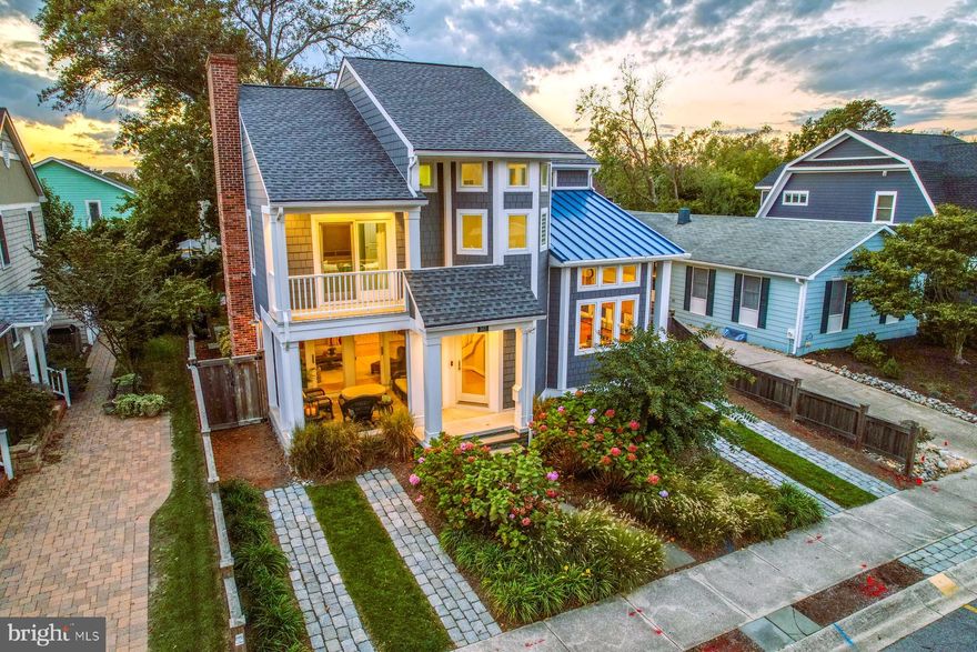 Welcome to your dream beach getaway! Nestled on a picturesque tree-lined street in the heart of South Rehoboth, this captivating contemporary cottage is your ticket to coastal living at its finest. With its prime location just 3 blocks from the boardwalk and a leisurely stroll away from vibrant Rehoboth Avenue with its array of shops, boutiques, and top-rated restaurants, this property offers the perfect blend of convenience and seaside charm.
As you step inside, you'll be greeted by the breathtaking interior spaces that define this home. Dramatic soaring ceilings create an open and airy atmosphere, while an abundance of natural light streams in through multiple exposures of windows, illuminating every corner of this splendid retreat.
The marvelous front porch becomes an extension of your living and entertaining space which is accessed by sliders from the main living room with wood burning fireplace and blend together the indoor/outdoor theme.  A striking rear great room with double height ceiling offers additional entertaining space.   The gourmet kitchen with updated stainless appliances, granite, kitchen island with butcherblock and a large dining table round out your public entertaining space.
This beach cottage was thoughtfully updated in 2018, ensuring it is in excellent, turnkey condition and ready for you to move in and start making memories. The main level boasts 2 spacious bedrooms, including a serene primary suite that provides a private oasis for relaxation. Upstairs, you'll find an additional 3 bedrooms, providing plenty of room for family and guests.
Outside features include a beautiful professionally landscaped garden with irrigation.  The rear yard features a bluestone paver patio, oversized shed for your bikes and beach toys and thoughtfully designed outdoor shower.
Whether you're looking for a year-round residence, a vacation home, or a lucrative rental investment, this stunning beach cottage offers endless possibilities. Don't miss your chance to own a piece of the Rehoboth Beach lifestyle. Contact us today to schedule a private viewing and start living the coastal lifestyle you've always dreamed of!