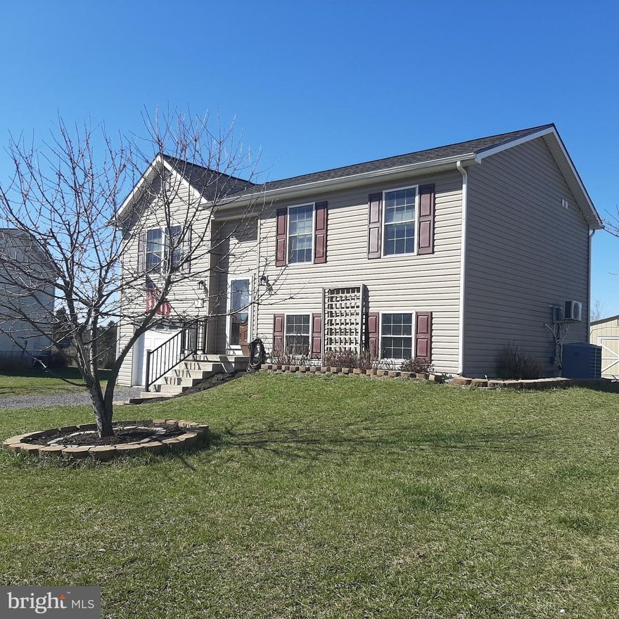Move in, start living! Well-tended home w/ thoughtful and practical upgrades/ features. New roof 2019 w/ 50-year transferable warranty. 20 x 16 Deck overlooks neighboring farm pond.  Stairs off deck to rear yard w/ fenced area of raised garden beds, 12 x 16 storage shed. New interior paint, lighting, wood vinyl plank flooring, custom garage and basement with mini split for heat/air and custom cabinets. New custom built-in cabinets in kitchen, open to Family Room.  Full bath connected to Primary Bedroom. Window/Blinds/Treatments convey. Freshly landscaped. Come take a look!