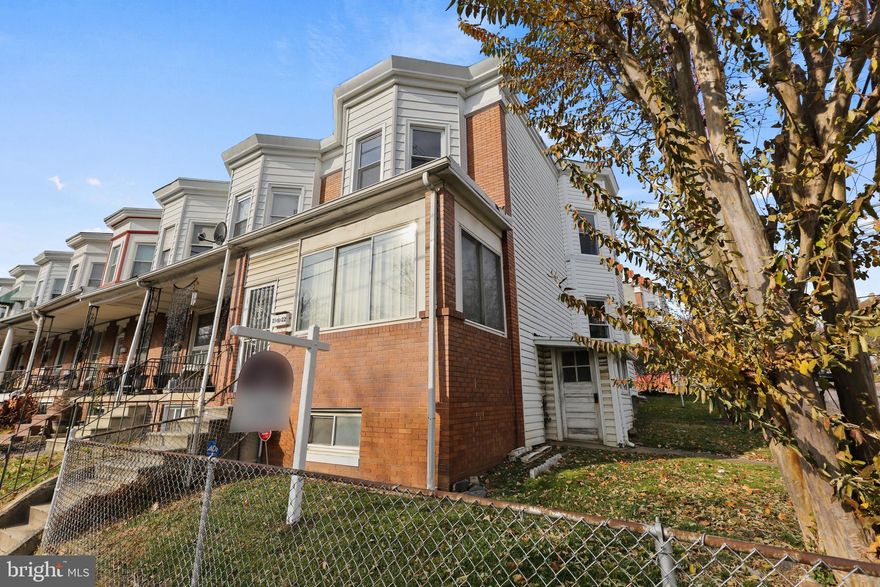 HVAC UNIT INCLUDED, brand new & fully operable, transfers with the property! Spacious 3 BR, 2.5 bathroom corner unit, located in the historic Hampden neighborhood!  Excellent option for a family home or an investment property.  Bay windows are all newly replaced, and provide natural light throughout.  Further upgrades include a brand new paint job and upgraded and restored flooring. Basement is equipped with a full bathroom, a separate outdoor entrance and PLENTY of storage space.  Enjoy the fully fenced-in yard with detached garage AND second parking pad!  The enclosed porch/sunroom offers even more natural light to the common areas.  Truly city living, with a touch of county feel!