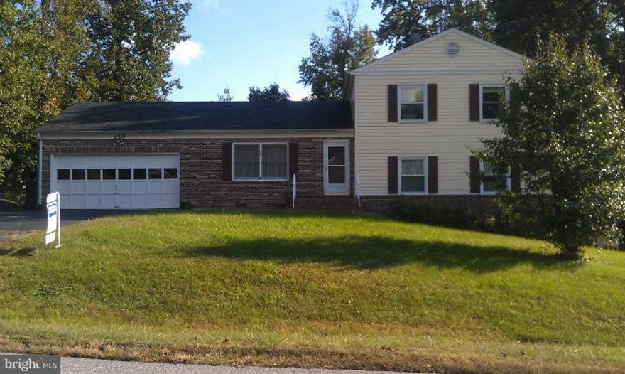 Great tri-level home in convenient area close to Quantico, I95, shopping and restaurants. Enjoy the cozy glassed-in porch for summer and the warm family room with pellet stove in the winter. Oversized garage is great for vehicles or storage. Washer and Dryer included. Large fenced backyard!