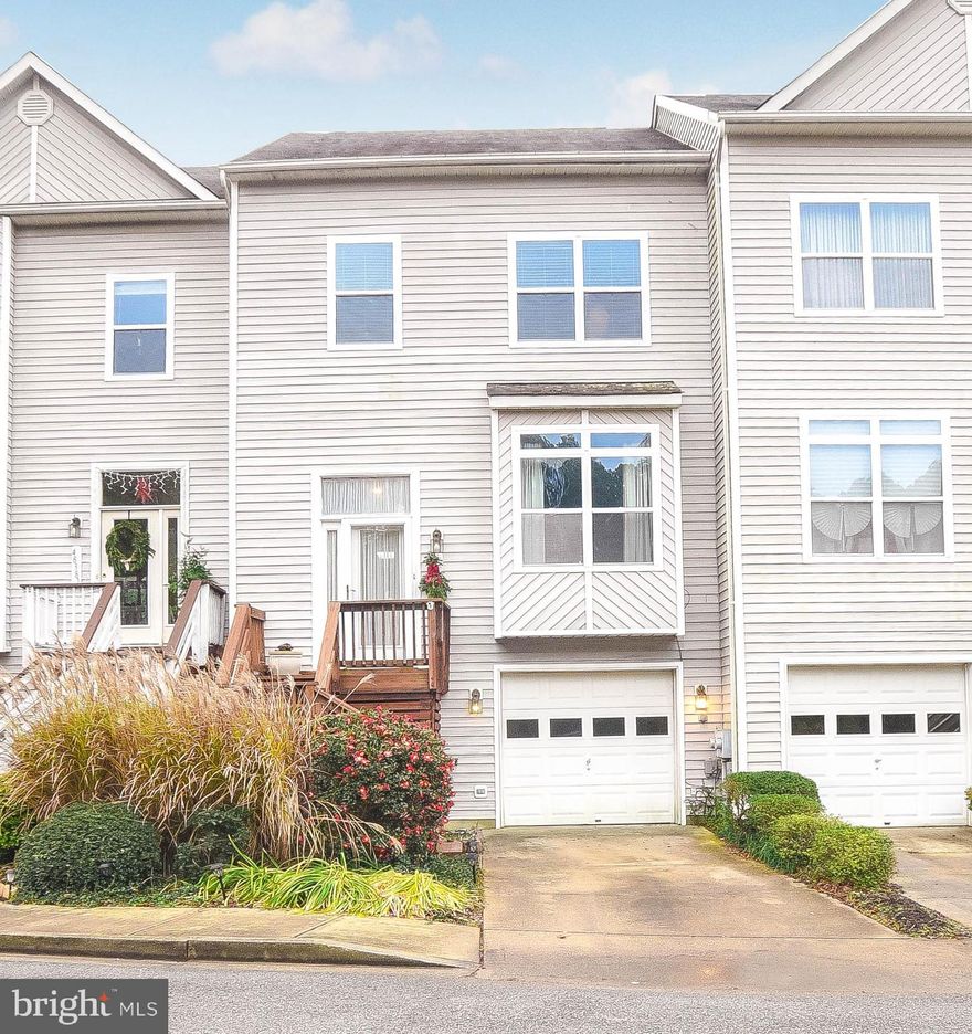 Absolutely gorgeous 3 story townhome with all the bells and whistles.  3 Bedrooms, 2 full and 2 half bathrooms.  Entry into the foyer leads you into the main living area which includes a combination living & dining room.  Hardwood floors in hallway and kitchen.  Kitchen with bar stool seating and a breakfast area.  Sliding doors open to the back deck with partial seasonal water view.    Great for a morning cup of coffee or evening cocktail.  Large primary bedroom with closet.  Primary bathroom has dual vanities, soaking tub and separate shower.  The primary bedroom also has a huge loft area perfect for office space, extra storage or den.  The basement includes a rec room, half bathroom, laundry area and  access to the garage.  Back yard walk out sliders lead to the patio.  New HVAC in 2020 and  new gas fireplace insert in 2019.  Community amenities include beach access, picnic area and jogging/walking trails.  Short ride to PAX base and local area shopping & restaurants.  Schedule appointments online through Showingtime.