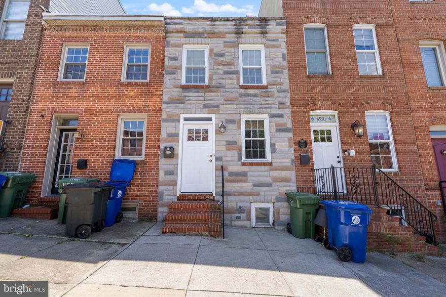 This beautifully maintained row home in Canton is a true gem, boasting a harmonious blend of modern amenities and classic charm. Step inside and be greeted by the elegance of hardwood floors that flow seamlessly throughout the open-concept living space. The exposed brick wall adds a touch of historic character, creating a warm and inviting atmosphere that is both unique and timeless.

The open kitchen features sleek stainless steel appliances, recessed lighting, granite countertops, and ample cabinet space.  Recessed lighting illuminates the space, highlighting the kitchen's sophisticated design and providing a bright, welcoming environment. 

The outdoor space offers a fenced-in patio area that's perfect for relaxing on warm summer nights. Imagine unwinding with a good book or hosting a small gathering with friends in this private oasis. The combination of modern amenities, newly updated HVAC and roof, thoughtful design, and an exceptional location makes this row home a true gem in Canton. Don't miss the opportunity to make it your own!