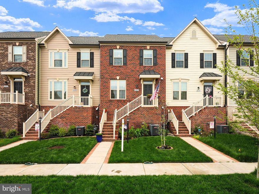 Welcome to this attractive brick front home in the sought-after Potomac Shores community! This townhome, just four years old, is freshly painted and ready for you to move in. With over 2,500 square feet spread across three levels, it's got all the space you need. The main level effortlessly intertwines the family room, kitchen, and dining area, creating an inviting space for gatherings. A charming sitting area enhances the ambiance, perfect for unwinding or engaging in lively conversations. The sun-drenched kitchen stands as the heart of the home, featuring a sizable island, stainless steel appliances, granite countertops, and upgraded espresso-colored cabinets. Step outside onto the deck, an ideal setting for relaxing and grilling. Completing this level is a convenient half bathroom. Venture upstairs to discover three generously sized bedrooms, including the spacious Primary Bedroom Suite boasting a tray ceiling, ceiling fan, walk-in closet, and attached primary bathroom. Each of the remaining bedrooms is equipped with ceiling fans and ample closet space, ensuring comfort and convenience. The laundry room is conveniently located on the bedroom level. Head down to the finished basement, where you'll find access to the rear-facing two-car garage, meticulously finished with custom touches that must be seen to be appreciated! It's PERFECT for the car enthusiast!! Additionally, the basement features a recreation room and an adjacent half bathroom, offering versatility and functionality for various lifestyle needs. The HOA fee ($180/month) covers high-speed internet, trash, and access to world-class amenities. Indulge in the state-of-the-art fitness facilities, the Jack Nicklaus Signature Public Golf Course, the Tidewater Grill, 3 swimming pools, multi-purpose courts, social facilities, over 9 miles of wooded trails, and a canoe/kayak launch. Take advantage of the vibrant community with numerous interest groups and activities, including book clubs, bunco, car club, caskers club, garden club, and more!! Covington-Harper Elementary School, Potomac Shores Middle School, and John Paul The Great private high school are conveniently located within the community, along with the Ali Krieger Sports Complex. Exciting future plans for the community include a planned VRE station and Town Center are in the works. Don't miss out on the opportunity to call this move-in ready gem your own, in the desirable Potomac Shores community.