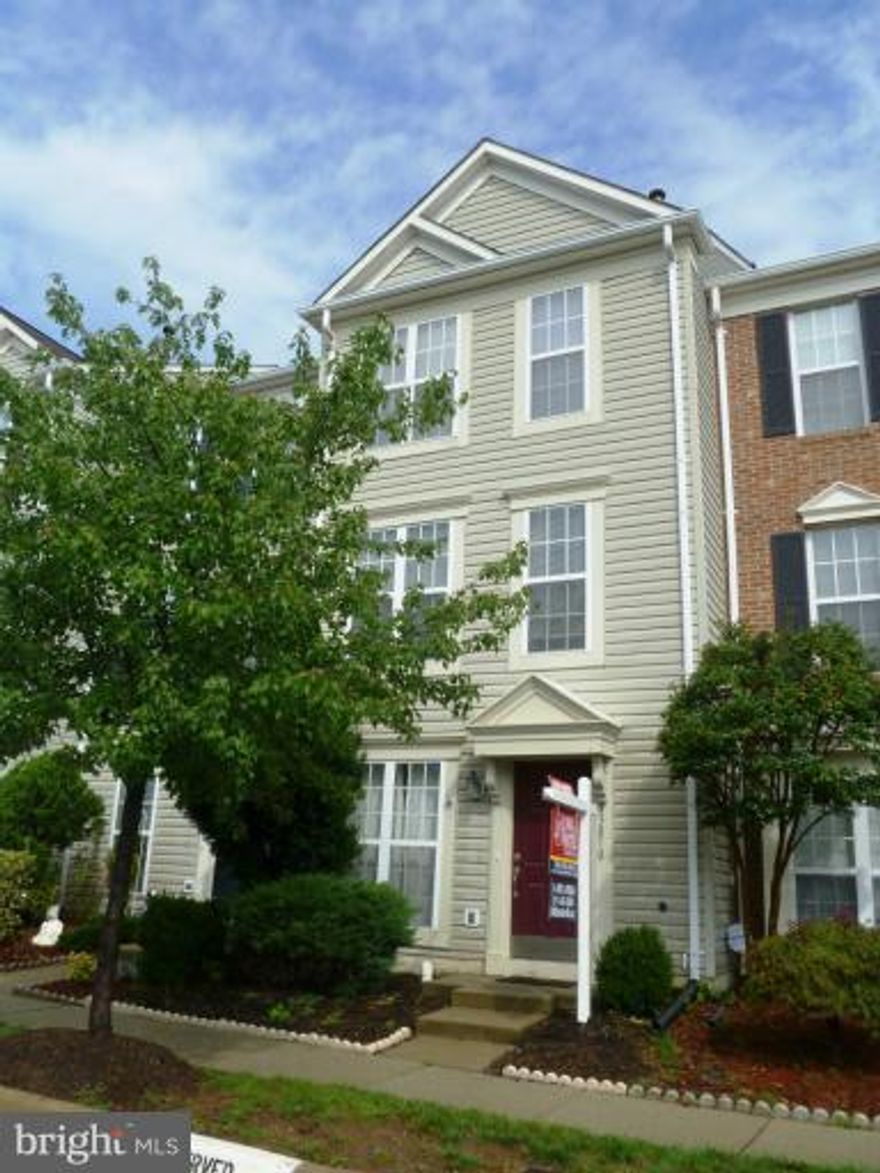 Fabulous TH in popular South Riding offers 3 bedrooms & 3 full baths,new carpet & paint, brand new eat-in Kitchen with Center Island, granite, SS appl, a large pantry. Pergo floors on main level. Walk-out in to a huge, fully fenced yard! MBA features his and hers walk-in closets! Good size family room with access to a deck!Backing to trees! Great location!!! Walk to Starbucks and other stores!