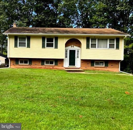 Have you ever been to visit the Elk Neck State Park, Elk Neck Forest/Walking Trails or been out on the Elk River boating and said this is a very nice area of Maryland to call home? Well now you can purchase this home that is located among all these great amenities! This large Bi-level brick and vinyl siding home is sitting on a .5 acre large lot backing to woods. There is large finished basement family room with a wood burning stove, a 4th bedroom, full bath, wash room, replacement sliding doors and a French drain around entire basement and sump pump with back up battery. The upper level has 3 bedrooms and full bath. Home has windows all around home and in basement to allow lots of sunlight in. The upper level living room has a very large window and there are shutters on all the windows. There is a deck on the rear of the home, lower concrete patio and a tree lined yard that creates a calming tranquil atmosphere. Home has high ceilings, plenty of storage areas, pull down steps leading to attic, large water heater and newer gutters with leaf covers, flower beds around home and walking distance to Elk Neck Forest and walking trails. Home is also located on a cul-de-sac with no through traffic! There are several Marina's, boat ramps and shopping just a very short drive away.