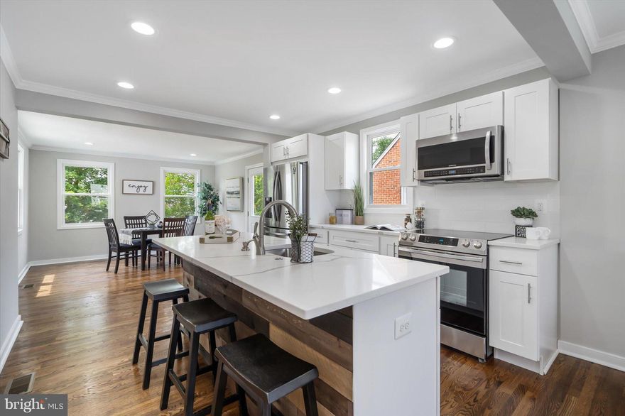 BACK ON MARKET- BUYER DID NOT PERFORM, THEIR LOSS IS YOUR GAIN. PRICED TO SELL!
This adorable cape cod in Riviera beach is much larger than it looks! It has 5 bedrooms with a possible 6th in the basement and 3 full baths. An additional family room and office space in the basement as well. Two bedrooms on the main level, two bedrooms upstairs, a fifth bedroom in the basement. Newly renovated throughout with fresh paint, refinished hardwood floors, new carpet, new doors and new roof. The kitchen is beautiful with quartz counters, upgraded stainless steel appliances, new cabinets and an island. Each floor has a renovated bathroom with custom tile and all new fixtures. New 200amp electric service, plumbing, HVAC, hot water heater and new split systems for the top floor bedrooms. Large flat rear yard and a private driveway for off street parking.  Riviera beach is a water privileged community with swimming areas, a fishing/docking pier and boat ramp. This one wont last long!