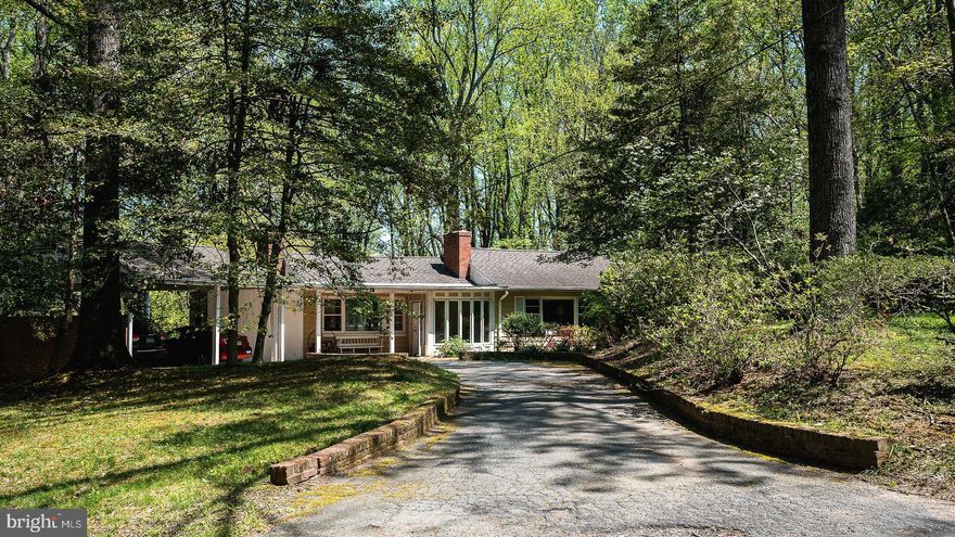 Prior Buyer Financing Fell Out - Now YOUR  Opportunity! *  Note:  Photos Reflect Previous Staging - Now Empty * Rare 4 Acre Oasis in north Vienna's wonderful Holly Hills * Just up the lane from beautiful Meadowlark Gardens Botanical Park and just down the lane from Lahey Lost Valley Park (well-kept local secret!) * Clarks Crossing Park and W&OD Trail also  an easy walk or bike ride away * Highly Desirable Location * Wolf Trap National Park / File Center (and Barns) only 1.5 Miles * Town of Vienna less than 2 miles * Dulles Airport less than 10 miles * Toll Rd East only 1.3 miles * Tysons 3.5 miles!

Charming 4BR, 3 Ba rambler with 2-car carport awaits your personal vision  * Renovate, expand or build your new custom dream home * Mother Nature, peace & quite surrounds you here - especially to the rear via expansive picture windows,  deck and sunroom / dining room off the kitchen * Hardwood floors throughout entire main level * Very nice family room with brick fireplace, built-ins, huge windows and sliding door to deck * Large owner's suite also offers fabulous view of the woods , walk-in closet with laundry chute to lower level, built-in bookcases, small den/office * Wonderful, huge (420 sqft !) art studio / hobby / exercise  room or home office addition with vaulted ceilings, skylights, custom lighting, slider door to accessory deck,  second stairwell to lower level * Expansive lower level 4th bedroom / in-law suite with walls of windows,  kitchenette, full bath and level walk-out to rear yard. 

Well & septic (including additional newly approved perc / drain field sites for future expansion / new build * Public water at street * 500 gallon propane  gas tank serves a Generac generator for whole house back-up electric * Natural Gas believed to be available along Brookside Lane (not yet confirmed) - could serve home for heat / cooking * Property to convey As-Is * Special opportunity here on a very special street (lane!) - Make it Yours!  ** For Specific Reasons, Seller Strongly Prefers Cardinal Title Group For Buyer and Seller Closing. **