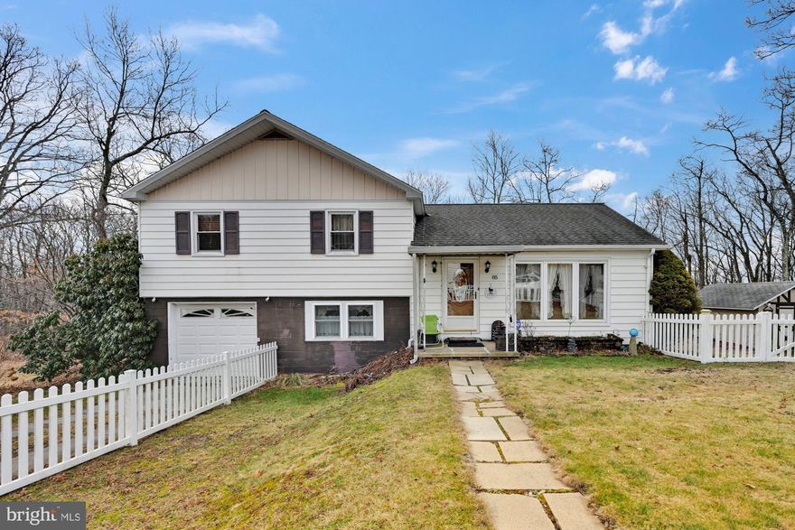 Welcome Home to 85 Weston Place....  Well maintained home in move in condition. Lovely Hardwood floors in the Living room and Dining room. A gas fireplace in the Living room which the Seller is leaving as part of the sale. Ductless Air/Heating unit on the Main level. Upgraded bright kitchen with all of the appliances remaining. Deck off of the sliding glass door in the Dining room area. Upper level offers three bedrooms all have closets and a full bath on this level. Lower level has a full bath/laundry room combo and a finished area with heat that can be used for your office or whatever you decide. One car Attached garage and possible off street parking. Situated on a large lot with two sheds for storage needs.