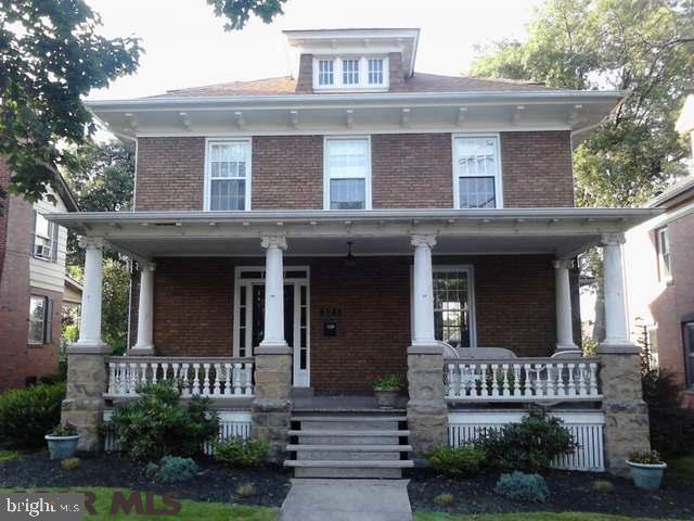 Inviting elegance and functionality meet in this beautiful forever home. Two story brick with majestic front porch. Large relaxing deck on rear with side steps walk up and fenced in back yard that leads to detached garage. Kitchen remodeled with new cabinets, granite countertops and stainless appliances in 2012. Pretty powder room and functional mud room make the kitchen space even more usable. Hardwood floors in dining room, living room and elegant foyer. Wood burning fireplace completes the first floor ambiance. Walk up the staircase and notice the stained glass window. Second floor features 3 to 4 bedrooms with 2 full baths and balcony! The bright and beautifully newly finished third floor adds more space and organization! Discover the possibilities. Schedule your private tour today!