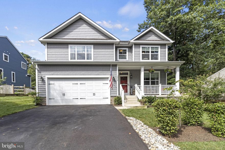 This is your chance to become a member of Annapolis' coveted Cape Saint Claire community! This gorgeous 4 bed, 2.5 bathroom colonial is the perfect blend of quiet and accessible. As you walk into the main level, you'll love how the abundant natural light reflects off the hardwood floors to highlight the spacious open floor plan. Gather around the fireplace (leased propane) with your guests, or whip them up a fancy dinner in your roomy gourmet kitchen, which features a six-burner gas stove, upgraded backsplash (2022), and upgrades such as a farm sink, larger cabinets and quartz countertops. You'll also find a smaller room with shiplap accents (2022), perfect for a home office, on this level. Upstairs, claim the primary suite as your own and live in luxury with tray ceilings, a walk-in closet, as well as a bathroom with a large soaking tub, stall shower, and dual vanity! Three more spacious bedrooms, a full bathroom, and washer/dryer round out this level. In the basement, you'll find plenty of unfinished space, perfect for you to design into the perfect home gym, game room, or den - there's even a rough-in for a bathroom! Outside, lounge on your own beautifully-designed 18x40' patio (2020), complete with a sizable gazebo (2022) to retreat under on those hot summer days. The backyard is fully-fenced and large enough for endless playing possibilities on warm days, and also features professional landscaping, an irrigation system, and a retaining wall. The home was professionally painted in 2022. Dual hot water heaters ensure you'll never accidentally take a cold shower; the home also has its own water treatment system (owned). Never fumble with a clunky garage door remote again - this garage has been fitted with a wifi-connected smart garage door. The hardwired POE cameras and installed security system add another layer of peace of mind at night and when you're away. As a member of the Cape Saint Claire community, enjoy access to community beaches, boat ramps, a community center, playgrounds, and picnic pavilions. Commuters will love the easy access to  the rest of Annapolis and Anne Arundel County via MD-2 and MD-50 - the Bay Bridge is just a short drive away for all last-minute escapes to the Eastern Shore! Beach lovers will also appreciate the very close proximity to Sandy Point State Park and its beaches. Don't miss this absolute gem of a home - it's sure to fly back off the market in no time!