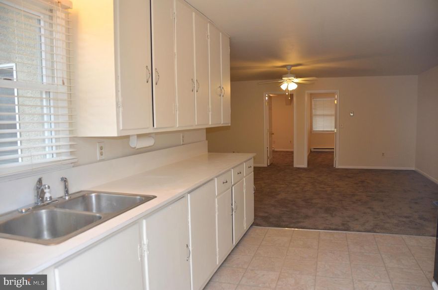 TWO BEDROOM UNIT (ONE OF FOUR UNITS) OFFERS AFFORDABLE LIVING  AND AMPLE PARKING - WALK TO COMMUNITY BEACH, PLAYGROUND AND MARINA.  NEWER CARPET AND FRESH PAINT--LAWN CUTTING SERVICE INCLUDED--BLUE RIBBON SCHOOLS - NO PETS - NO SMOKING - LAUNDROMAT NEARBY - READY FOR IMMEDIATE OCCUPANCY