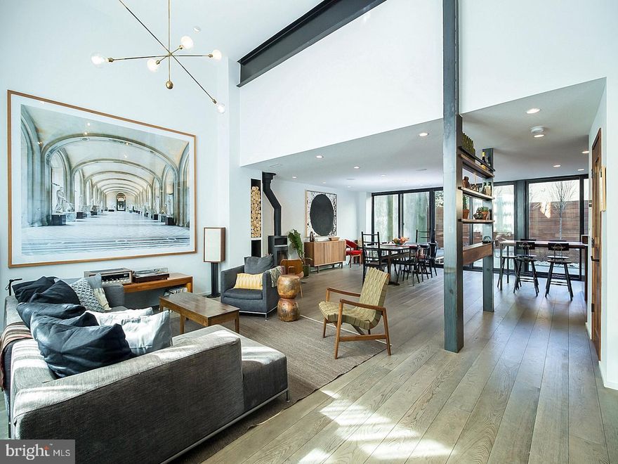 A premier residence on one of the City's most lovely blocks--Little Fitz--a quiet tree-lined street with Colonial homes. 130 & 134 Fitzwater is an extremely rare Center City single (detached) home. Custom built and superbly curated for a most discerning owner (completed in 2015)--on two very private lots. This 4 bedroom, 3.5 bath, plus family room and den home also offers GARAGE Parking, a 34' x 19' rear yard, a huge roof deck with skyline views, and an off-street courtyard entrance where family and friends can park their bikes, play, garden, and just enjoy the extra land.  The lot also includes a separate 1 bedroom glass structure perfect for an office, guest suite, or au-pair suite.  The main house offers wide-plank Italian oak hardwood floors (sustainable from Stile) and artisanal and custom quality tasteful finishes and woodwork throughout the home. Designed for spectacular light throughout the day. Enjoy an open (1st floor plan) with 14' ceilings, a 35' x 32' footprint with a remarkable Henrybuilt Kitchen System (Miele, Sub-Zero, all custom) with family eating area, and a huge open living and dining space.  All of this is open to a 35' wall of glass overlooking the huge landscaped garden. Also, a large entry area with seating, storage for shoes, and a walk-in coat and storage closet. Half-bath. The (2nd floor) offers a private master suite with a spa master bath with radiant floors and steam shower. Nice-sized den/office. The (3rd floor) opens to a huge family room and offers 3 large bedrooms attached to 2 full baths. The finishes throughout are superb, and offer the finest in taste, quality, and craftsmanship. The roof deck is the 3rd significant outdoor space and expands the entire footprint of the home with full panoramic views and a year-round hot tub. With a 95 WalkScore this location offers the best of all worlds- quiet street with colonial homes and virtually no car traffic. Walkable to all that Queen Village and Society Hill have to offer (Head House Farmers' Market, Kanella, Hungry Pigeon, Palm Tree, Taresa's, Lucky's, and so much more). Notes: The home includes a deeded totally private garage space on the adjoining lot. Enter the courtyard from a gate on Fitzwater Street. 3-zone HVAC. Nest thermostats. Lutron dimmable light switches throughout. Wired for sound with ceiling speakers throughout. Ample storage. An important Philadelphia residence in the MEREDITH School Catchment. 2-year old new construction with TAX ABATEMENT.