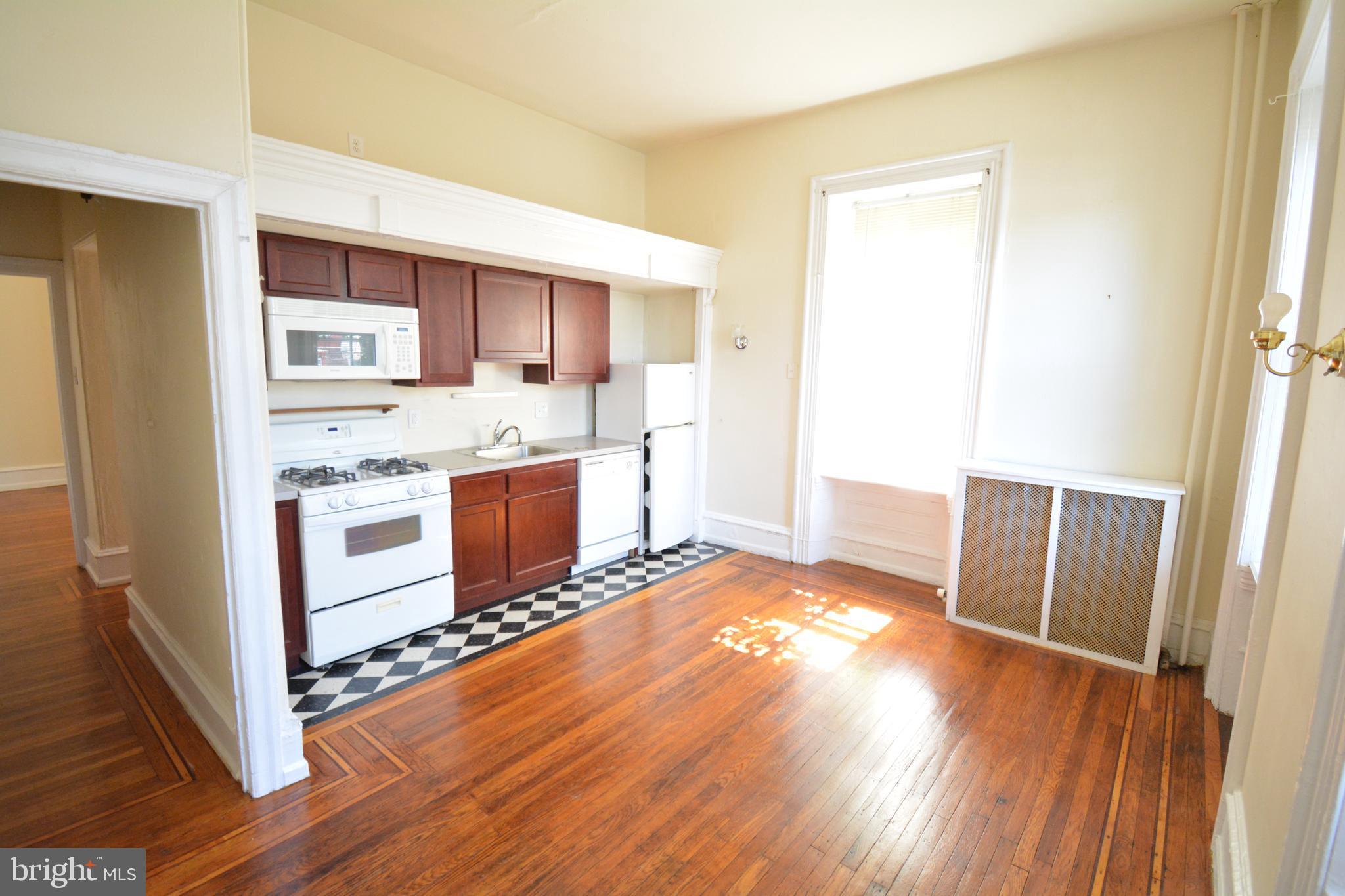 Spacious and artsy 1 bedroom apartment in historic Germantown available for quick move in. Heat, hot/cold water and cooking gas included - tenant just pays electric. Hardwood floors throughout. Off street parking. Fully loaded kitchen with dishwasher and gas range. Tons of natural light. Close to public transportation. Cats permitted with no added fee. Reach out for showings and applications. Video tour available. Credit over 650 required.