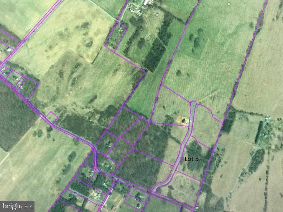 Build your dream home on this rolling 6.3 acres of land located in the country yet close to all amenities MD/VA markets. Last lot available in this 6 lot farm(et)like subdivision so bring your horses and build your barns and outbuildings. Limited regulations for the community and please see the documents of the listing for your review as well as plat etc. This lot is permit ready as well has been drilled by the owner this past fall.
