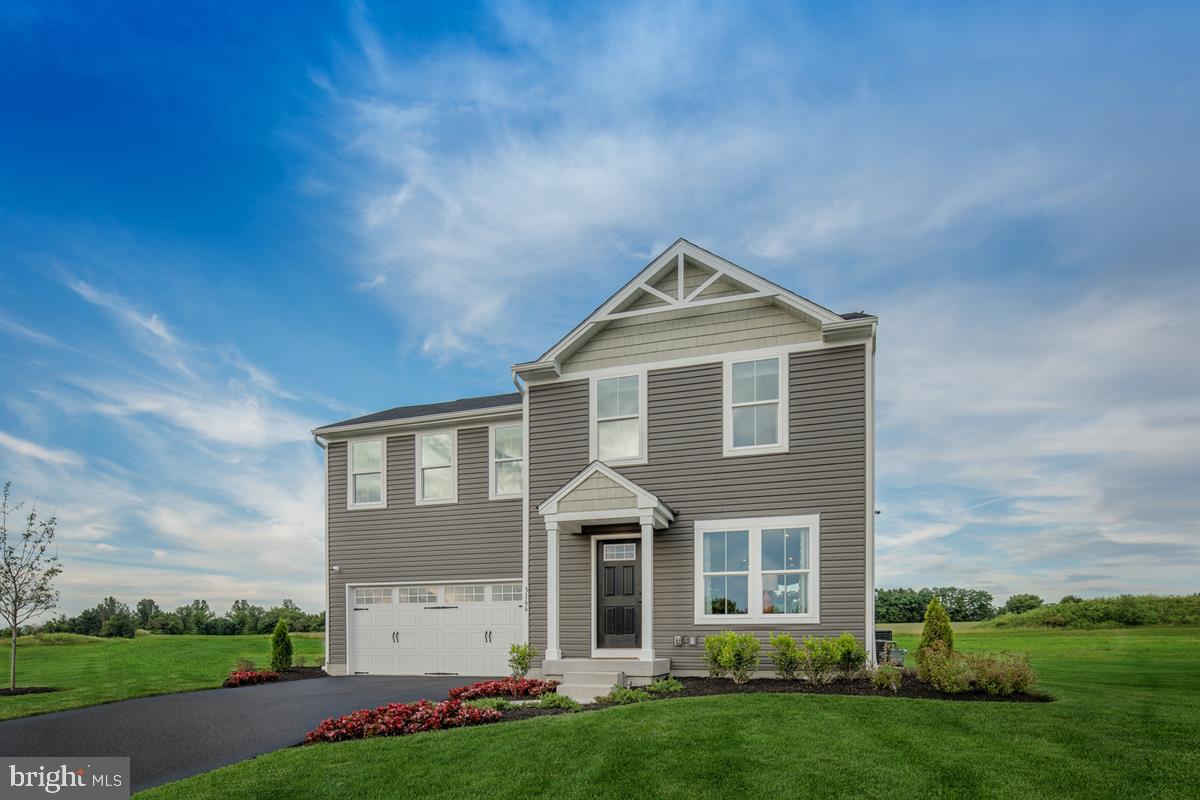 The BIRCH at Meade's Crossing, our newest Carroll County community located in Taneytown - just 10 minutes from Westminster. Ryan Homes gives you the features you need at the price you want! 4BR/2.5BA/2-car Garage, Built Smart, energy efficient, open concept home with custom designer interior and all appliances including washer/dryer. Lots of space and a modern design. As you enter the foyer, the open first floor greets you with a light and airy feeling. A powder room is placed for convenience. The great room flows into the dinette and kitchen area so you never miss a moment with friends or family, while a coat closet by the garage door gives plenty of storage. An island lends a casual place to eat or entertain. Upstairs the generous space continues, with a broad stairway that leads to an open landing for a feeling of arrival. The bedrooms are oversized and elegant, with even the secondary bedrooms sporting generous closet space. The owners bedroom sits off on a little wing of its own, perfectly accessible but still private and removed from the hustle-bustle. It features a private bath and a fantastic closet so storage is never an issue! HOA offers a future community pool, multi-purpose courts, clubhouse, playground, dog park, walking trails, open space and a playing field! Other Homesites available and 5 Floorplans to choose from. Photos are representative only.