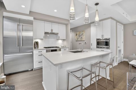 Photo of 8302 Woodmont Avenue #203, BETHESDA, MD 20814 (MLS # MDMC2217512)