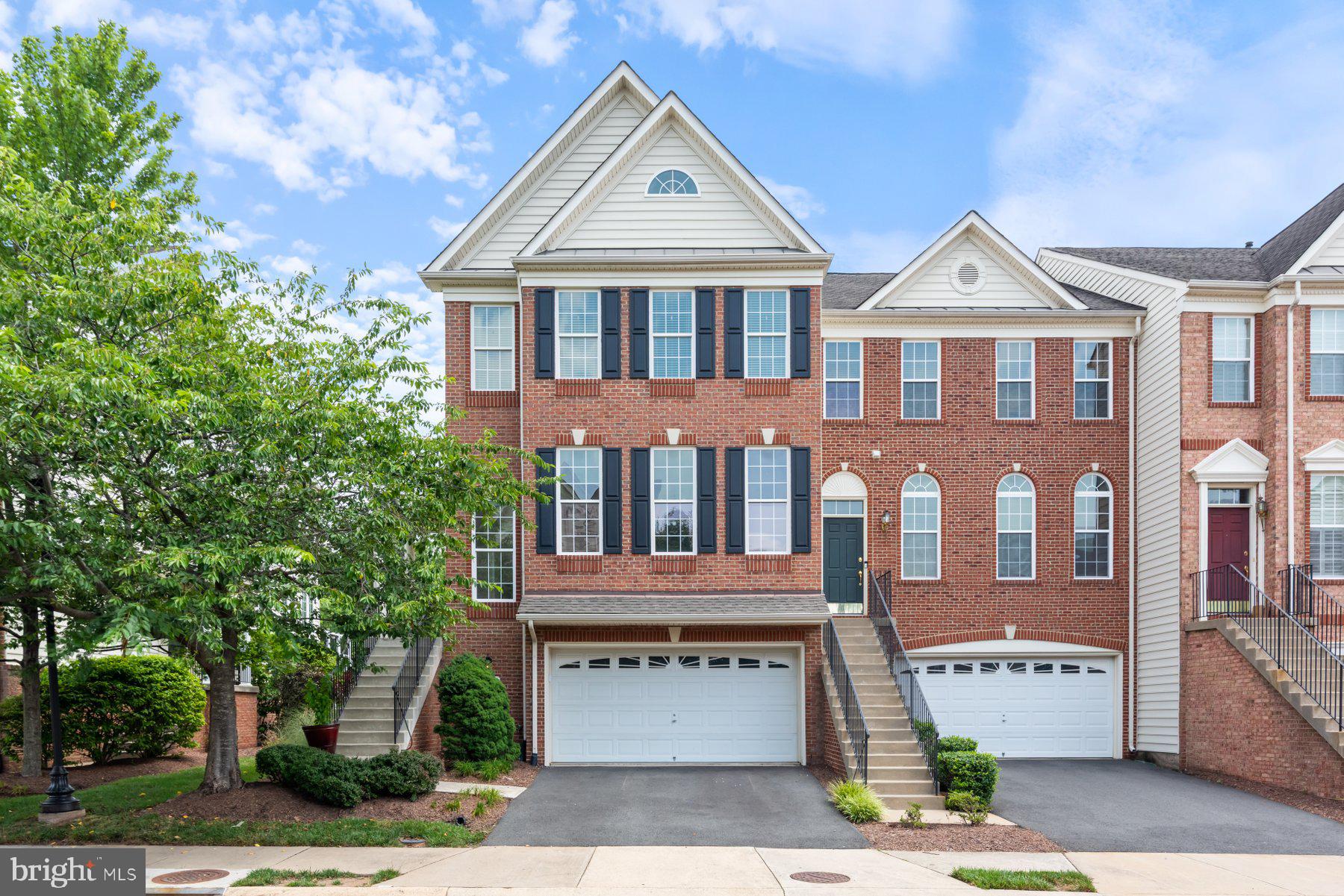 Awesome Luxury Townhome with Three-Story Addition Backing to Trees! Move Quick for This Beautiful Home! This End Unit with Walk-Out Basement Has it All! Grand Primary Bedroom Suite! Renovated Open Floor Plan Kitchen with Family Room & Sunroom! Lower Level with Large Recreation Room, Full Bath, and Bedroom/Private Home Office! Hardwood Floors, Granite Countertops, Stainless Steel Appliances, and Upgrades Throughout! Large Deck and Patio Enjoy Private Views! Belmont Country Club Amenities (Lawn Care, Cable TV, High Speed Internet, Gated Community, Pools, Tennis Courts, Access to the Country Club) Included in Rent!